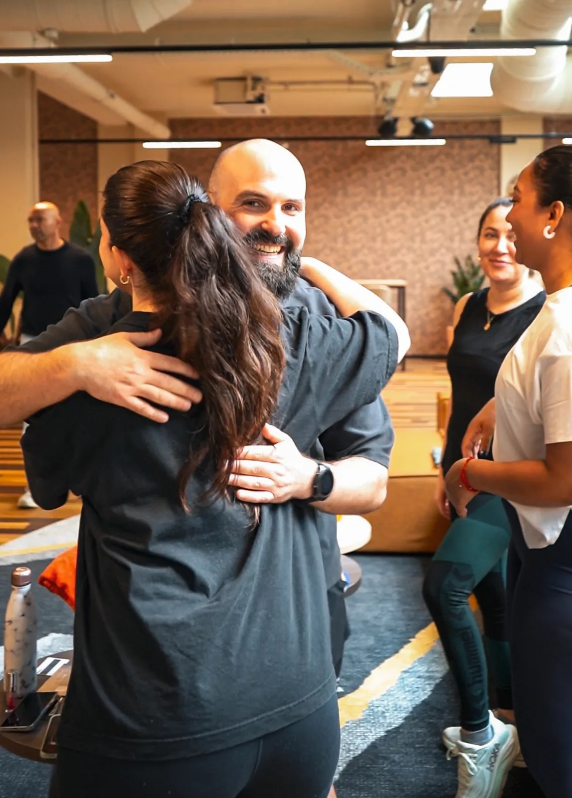 Yoni embracing a happy client