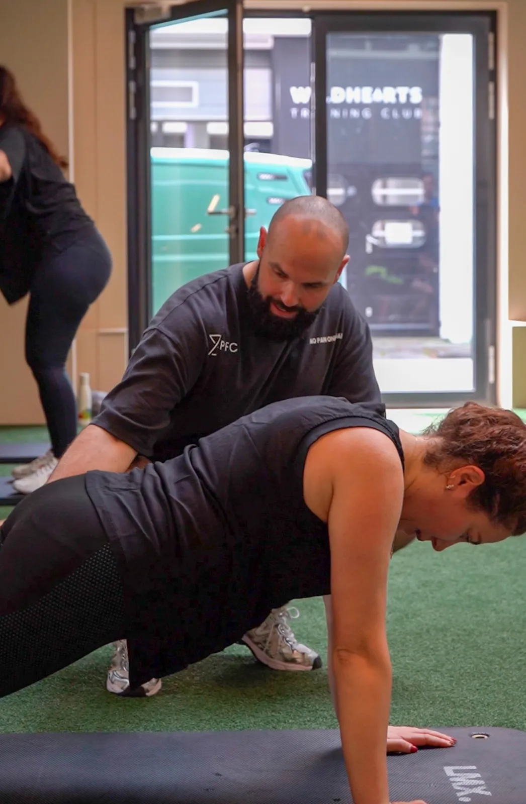 Yoni coaching a client hands-on